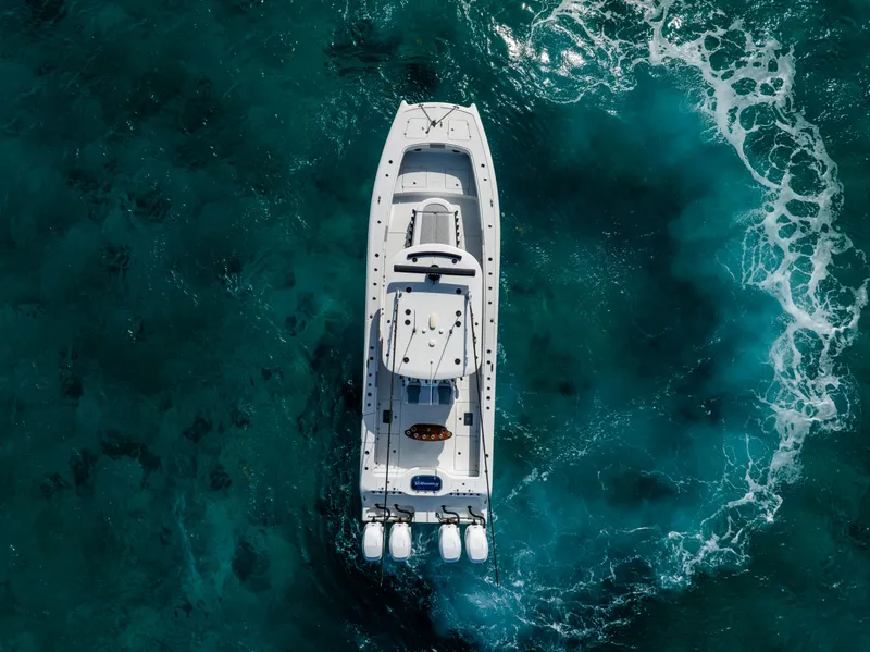 Slide: The Image of Aerial view of 2022 Freeman 37 VH boat on turquoise ocean waters. - 6