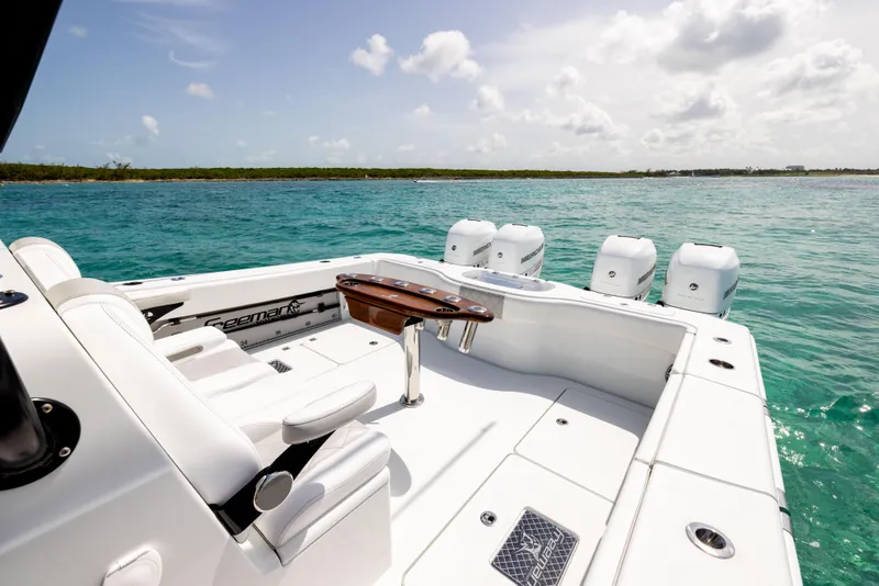 Slide: The Image of Freeman 37 VH 2022 boat on turquoise water with clear sky. - 25