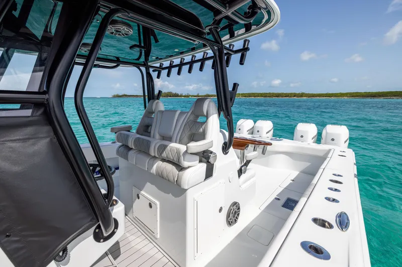 Slide: The Image of Luxury Freeman 37 VH boat interior, 2022 model, with plush seating and ocean view. - 39