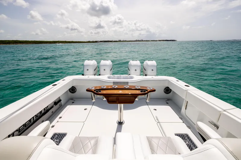 Slide: The Image of Freeman 37 VH 2022 boat with quad engines on open sea. - 24