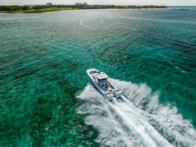 Slide: The Image of Freeman 37 VH boat cruising on turquoise waters, 2022 model. - 2