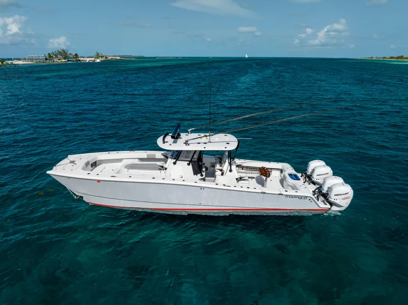 Slide: The Image of 2022 Freeman 37 VH boat on clear blue ocean water, side view. - 11
