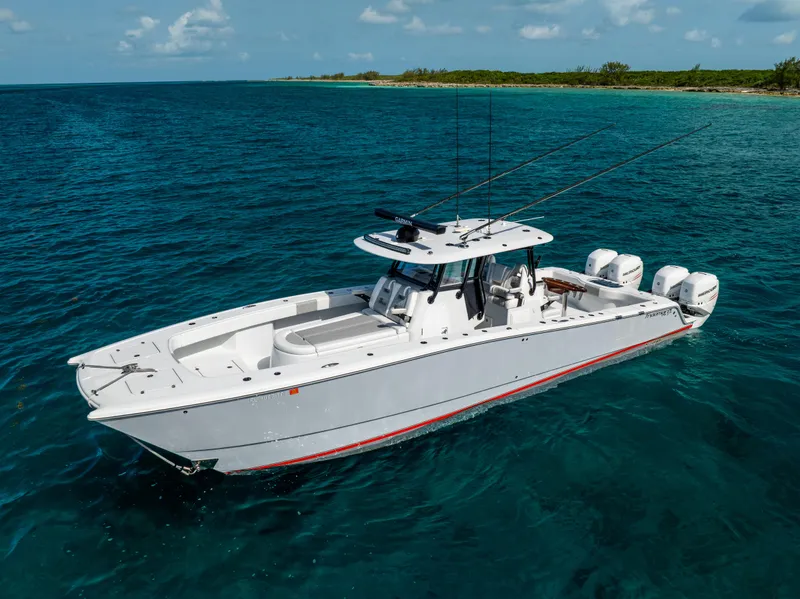 Slide: The Image of 2022 Freeman 37 VH boat cruising on clear blue ocean waters. - 10