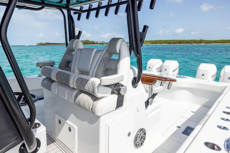Slide: The Image of Luxury seating on a 2022 Freeman 37 VH boat, with ocean backdrop. - 40