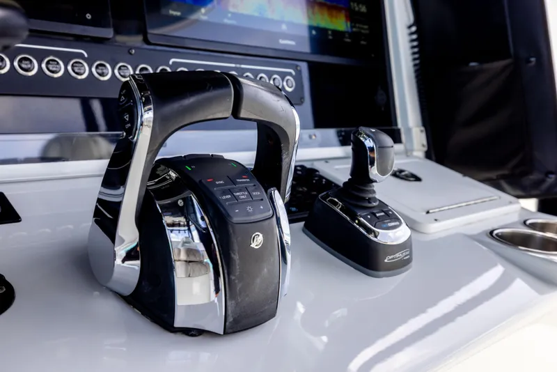 Slide: The Image of Control panel of a 2022 Freeman 37 VH boat with throttle and joystick. - 46