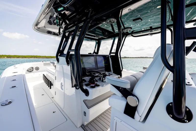 Slide: The Image of 2022 Freeman 37 VH boat interior with modern helm and ocean view. - 35