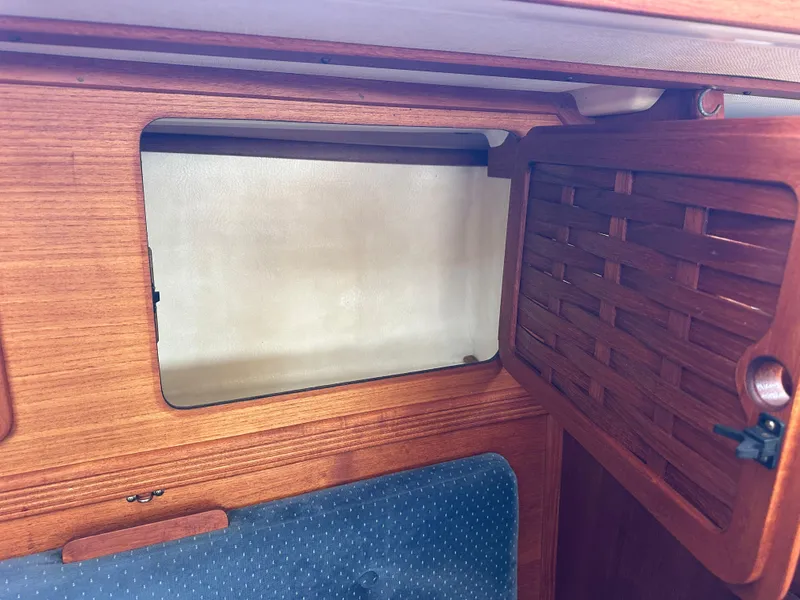 Slide: The Image of Wooden cabinet interior on a 1985 Sabre 34 MKI sailboat. - 21