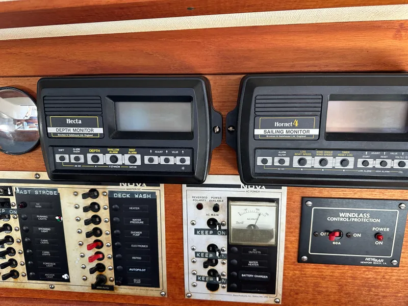 Slide: The Image of Control panel of a 1985 Sabre 34 MKI sailboat with depth and sailing monitors. - 32