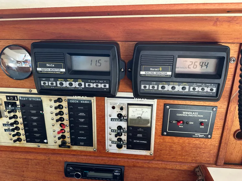 Slide: The Image of Control panel of a 1985 Sabre 34 MKI sailboat with depth and sailing monitors. - 35