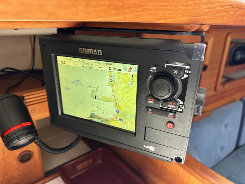Slide: The Image of Simrad navigation system on 1985 Sabre 34 MKI sailboat, displaying nautical map. - 38