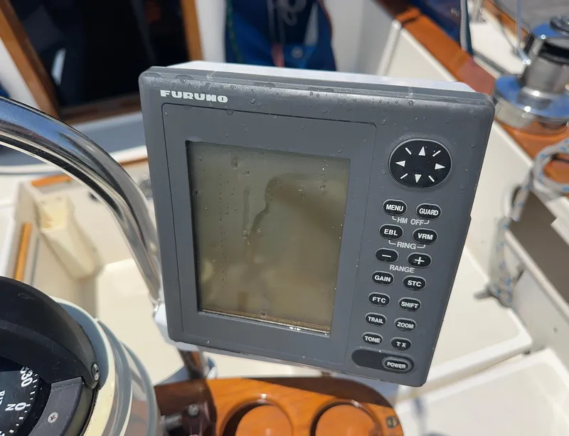 Slide: The Image of Furuno marine navigation device on 1985 Sabre 34 MKI sailboat, cockpit view. - 44