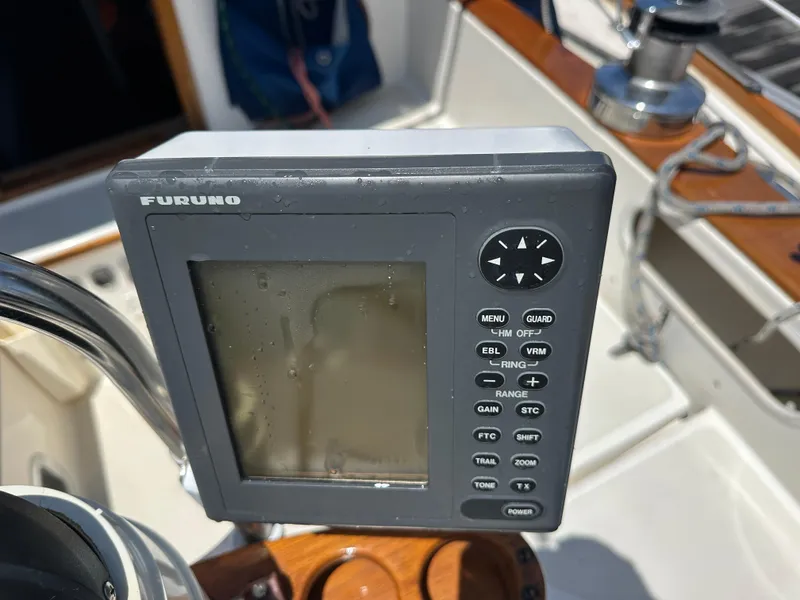 Slide: The Image of Furuno marine navigation device on 1985 Sabre 34 MKI sailboat cockpit. - 45