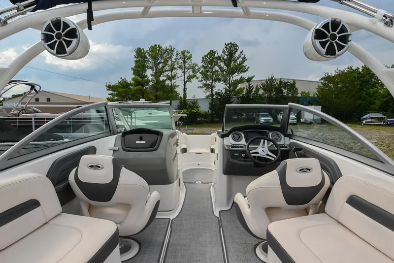 Slide: The Image of Interior of 2018 Chaparral 264 Sunesta boat with modern seating and dashboard. - 20