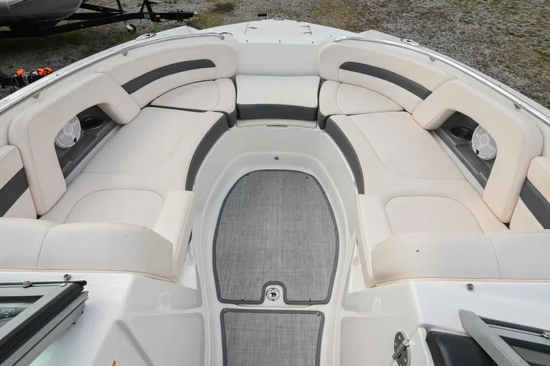 Slide: The Image of 2018 Chaparral 264 Sunesta boat interior with spacious seating and modern design. - 29