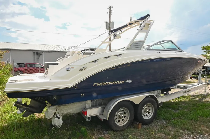 Slide: The Image of 2018 Chaparral 264 Sunesta boat on trailer, parked outdoors. - 8