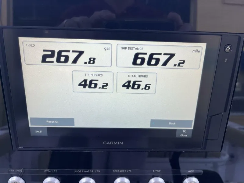 Slide: The Image of Garmin display showing fuel usage and trip data for 2021 Sportsman 231 Heritage boat. - 4