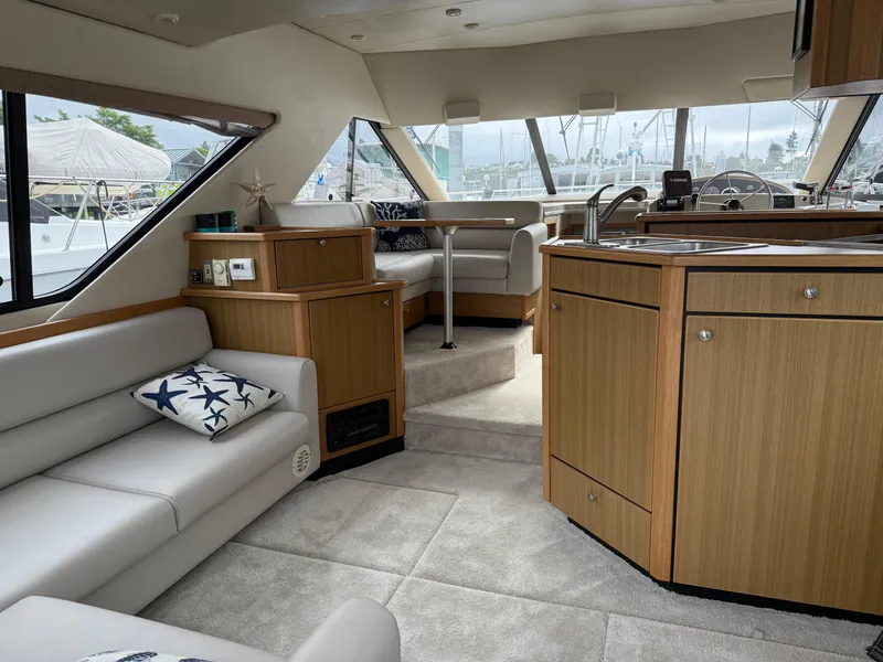 Slide: The Image of Interior of 2001 Bayliner 3988 Command Bridge Motoryacht with modern furnishings and spacious layout. - 11