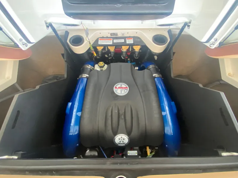 Slide: The Image of 2022 MasterCraft X26 engine compartment with Ilmor engine components visible. - 39