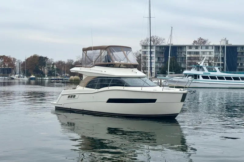 Slide: The Image of 2016 Carver C34 Command Bridge Starboard Bow - 11
