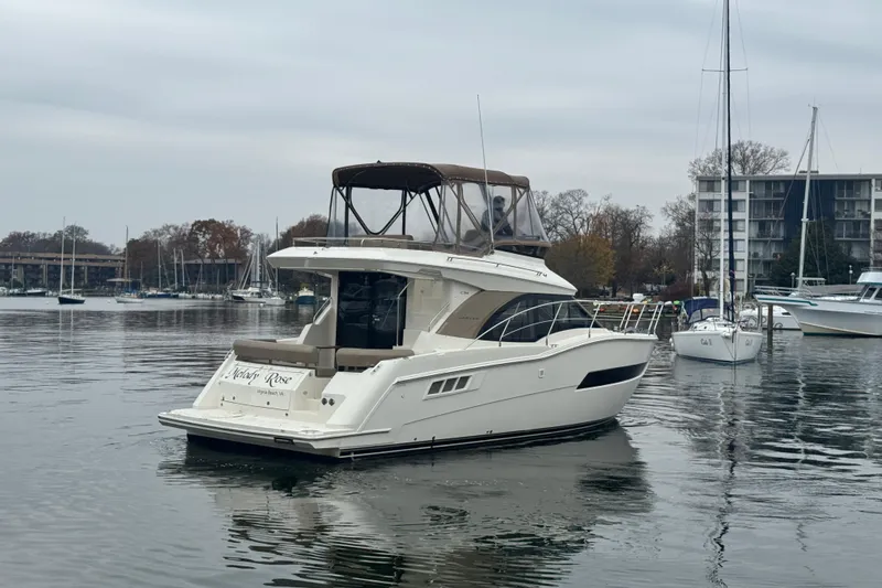 Slide: The Image of 2016 Carver C34 Command Bridge Starboard Quarter - 6