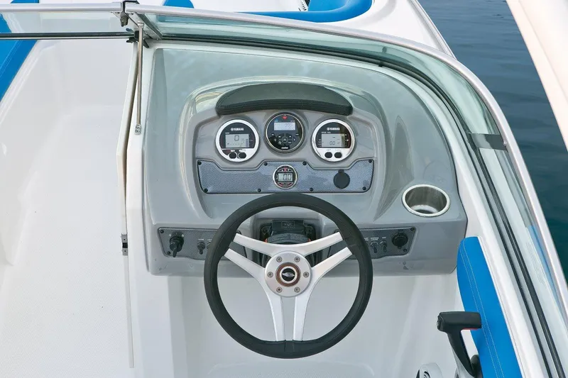 Slide: The Image of 2018 Chaparral 21 H2O Sport OB dashboard and steering wheel. - 58
