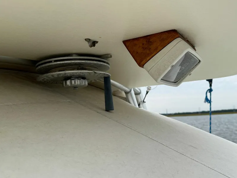 Slide: The Image of Speaker and winch on 2005 Custom Stardust 32 Express boat deck. - 16