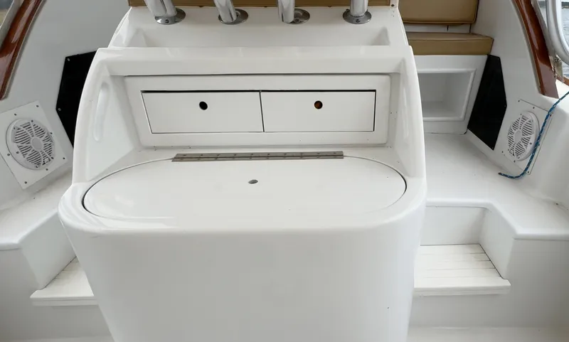 Slide: The Image of Interior view of 2005 Custom Stardust 32 Express boat with storage compartments. - 20