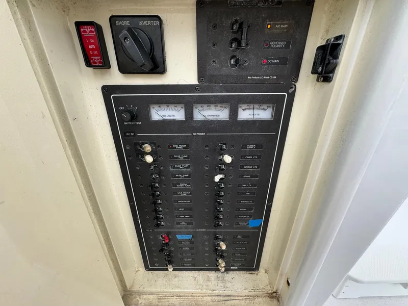 Slide: The Image of Electrical control panel on a 2005 Custom Stardust 32 Express boat. - 28