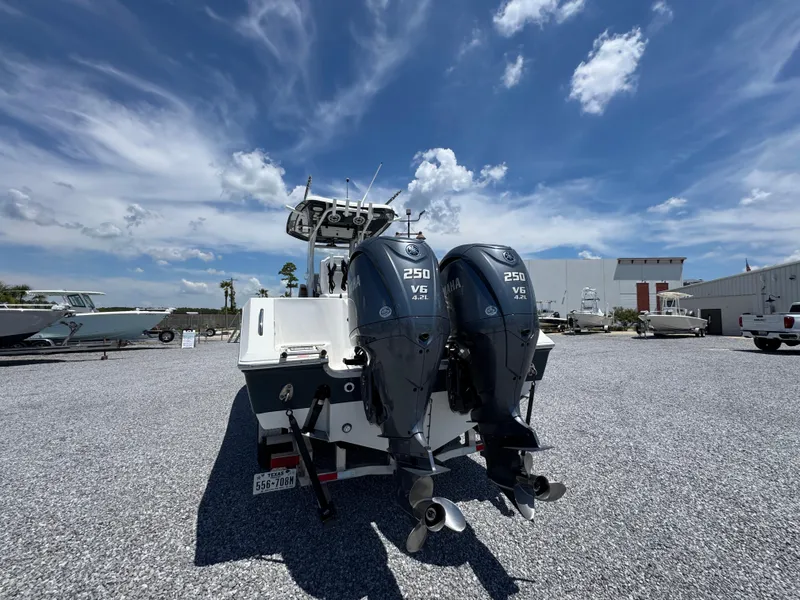 Slide: The Image of 2023 Tidewater 282 CC Adventure Bluewater boat with dual Yamaha 250 V6 engines. - 14