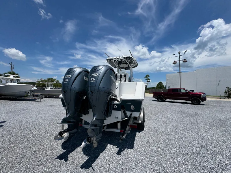Slide: The Image of 2023 Tidewater 282 CC Adventure Bluewater boat with dual Yamaha 250 V6 engines. - 16