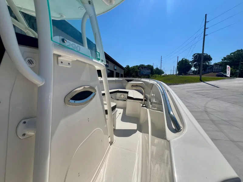 Slide: The Image of 2023 Sailfish 290 CC boat interior with sleek design and modern features. - 17
