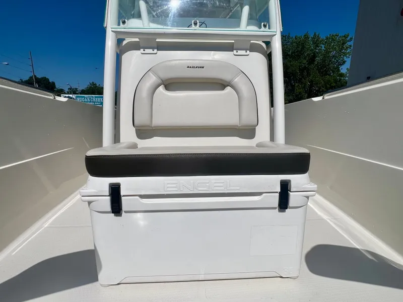 Slide: The Image of 2023 Sailfish 290 CC boat interior with Engel cooler and seating. - 28
