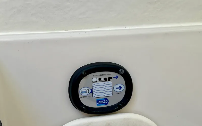 Slide: The Image of Waste holding tank indicator on 2023 Sailfish 290 CC boat. - 33