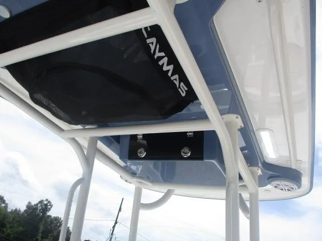 Slide: The Image of 2025 Caymas 26HB boat T-top with storage and speakers, viewed from below. - 4