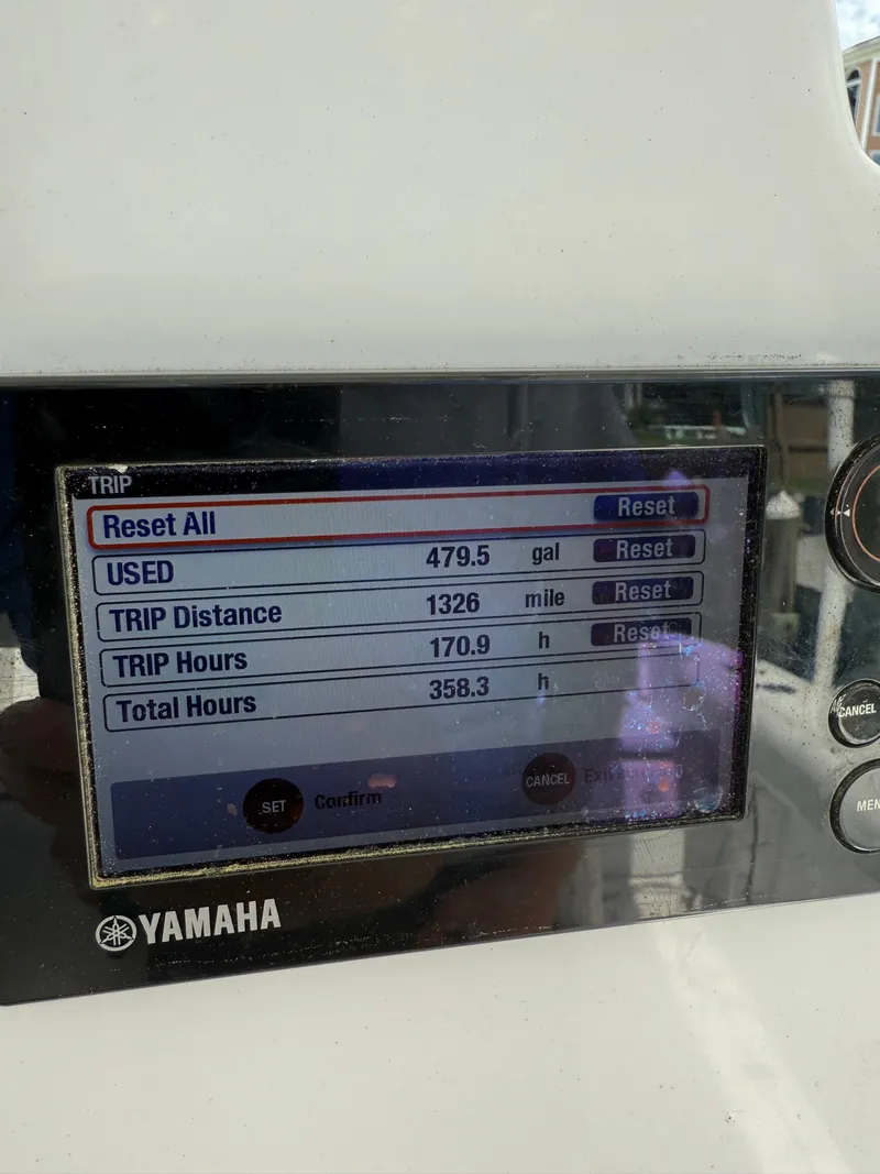 Slide: The Image of Yamaha display showing trip data: 479.5 gallons used, 1326 miles, 170.9 trip hours. - 15