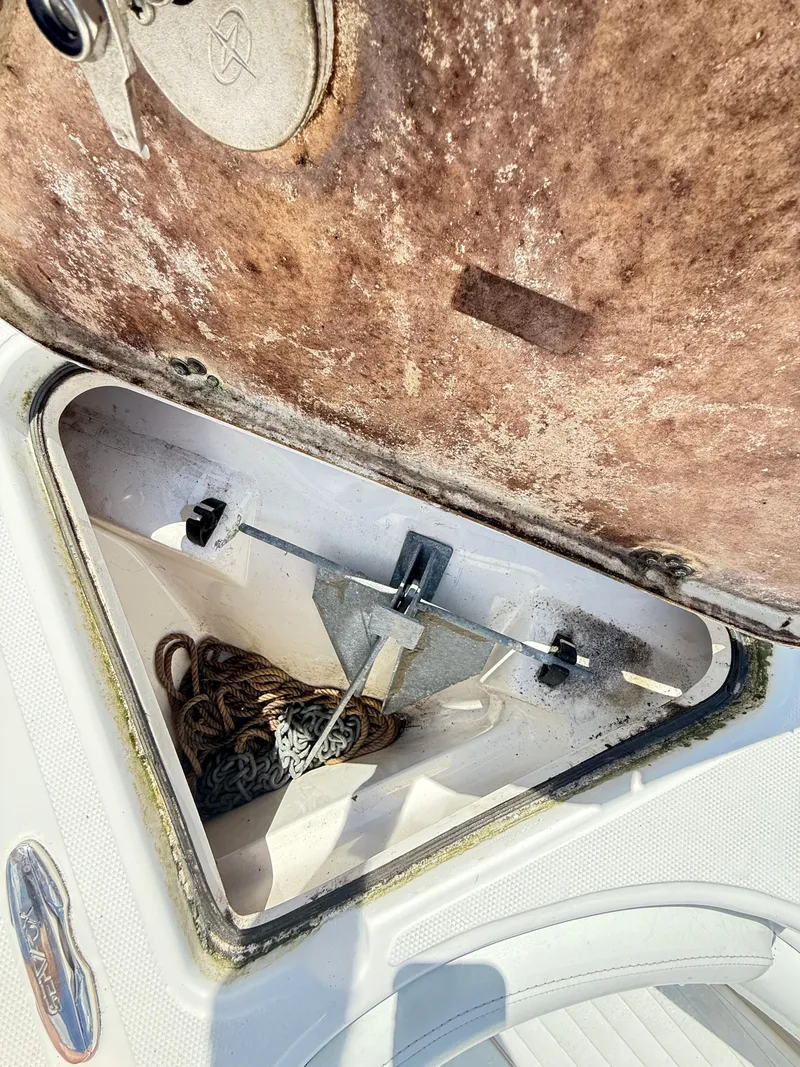 Slide: The Image of Anchor storage compartment on a 2015 Sea Fox 256 Commander boat. - 26