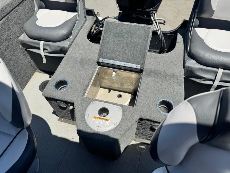 Slide: The Image of 2013 Smoker Craft Ultima 172 boat interior with seating and storage compartment. - 15
