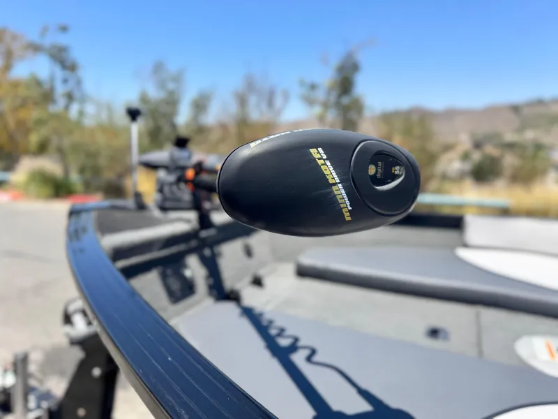 Slide: The Image of 2013 Smoker Craft Ultima 172 boat with Minn Kota trolling motor, outdoor setting. - 8