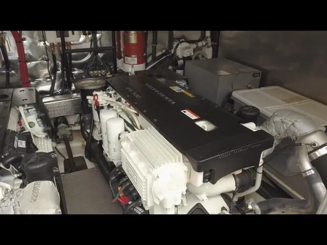 Slide: The Image of Engine room of 2017 Regal 46 Sport Coupe with visible components and machinery. - 14