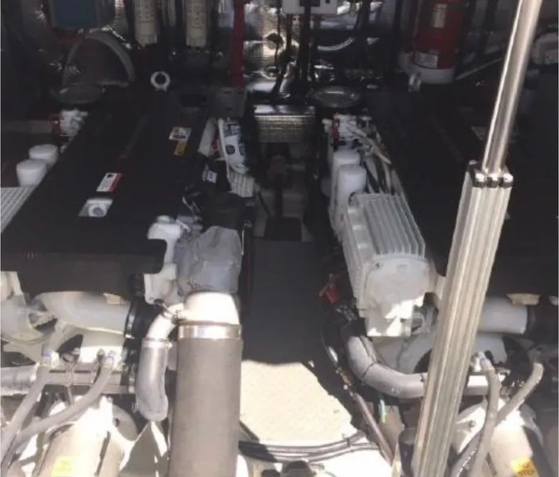 Slide: The Image of Engine room of a 2017 Regal 46 Sport Coupe with visible components. - 9