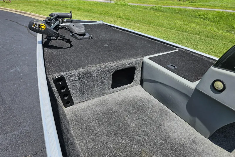 Slide: The Image of 2016 Tracker PRO160 boat deck with trolling motor and rod holders. - 6