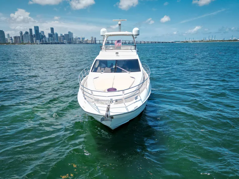 Slide: The Image of Azimut 54 Fly 2015 yacht cruising near city skyline on a sunny day. - 12