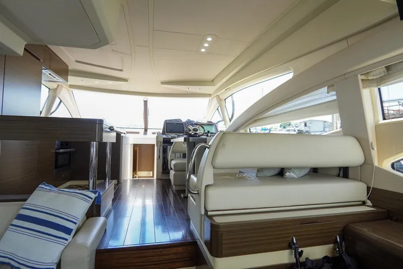 Slide: The Image of Luxurious interior of 2015 Azimut 54 Fly yacht with modern design and plush seating. - 37
