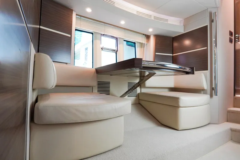 Slide: The Image of Luxurious interior of 2015 Azimut 54 Fly yacht with modern seating and table. - 48