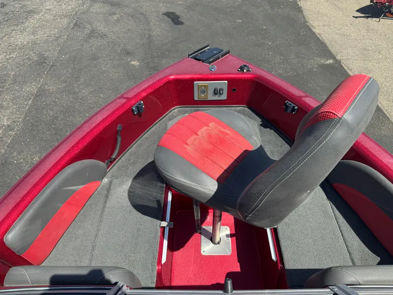 Slide: The Image of Lowrance fishfinder on Stratos 386 XF 2014 dashboard with gauges and controls. - 11