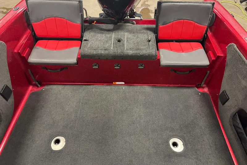 Slide: The Image of Red and gray interior of a 2014 Stratos 386 XF boat with seating. - 14