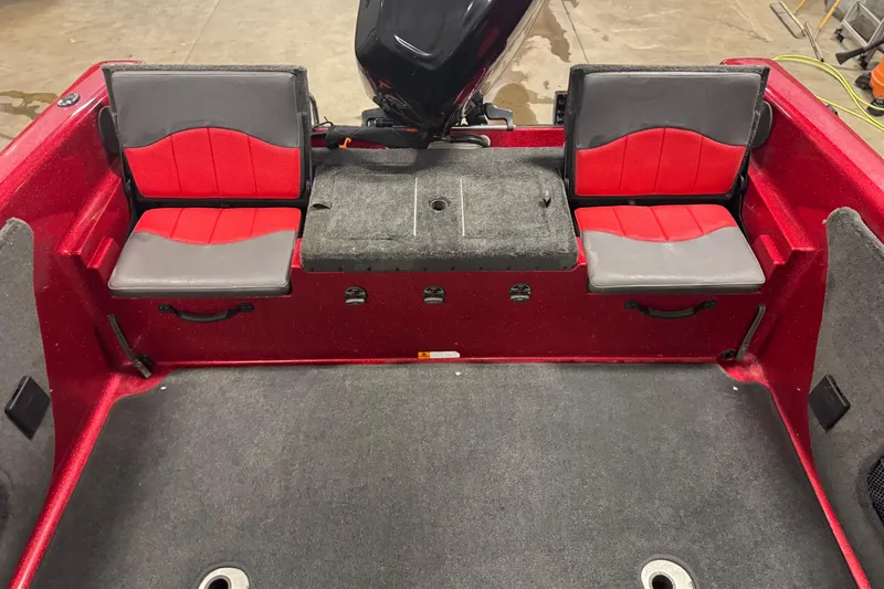 Slide: The Image of Red and gray seating area of a 2014 Stratos 386 XF boat. - 15