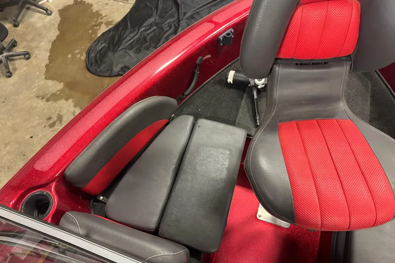 Slide: The Image of Red and black seating in 2014 Stratos 386 XF boat interior. - 20