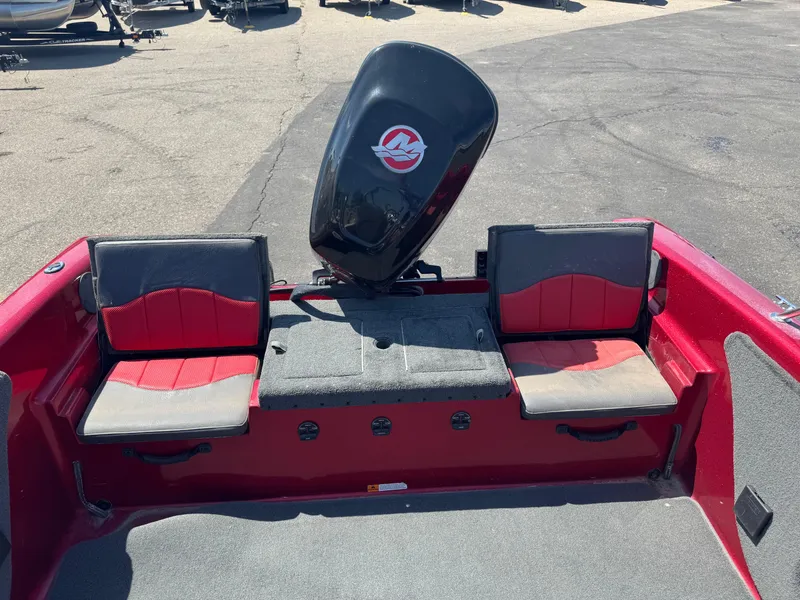 Slide: The Image of Red Stratos 386 XF boat dashboard with steering wheel and Lowrance display, 2014 model. - 9