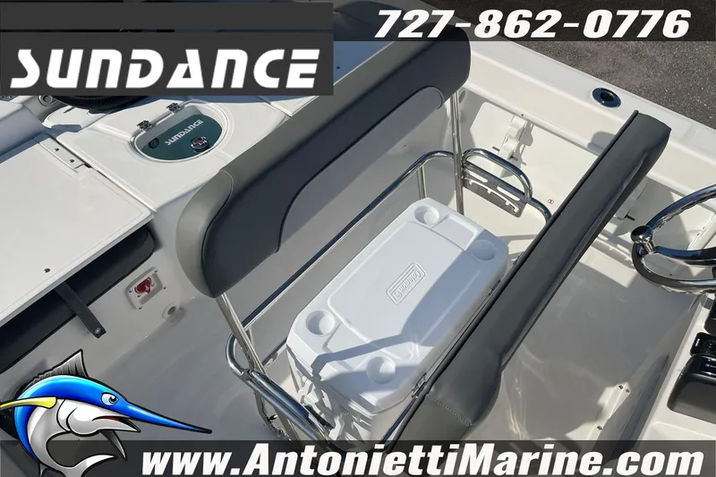 Slide: The Image of 2025 Sundance DX20 boat interior with seating and cooler, featuring Antonietti Marine branding. - 16